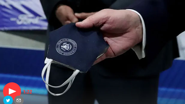 Il Presidente Donald Trump non ondossa una mascherina in visita alla Ford in Michigan